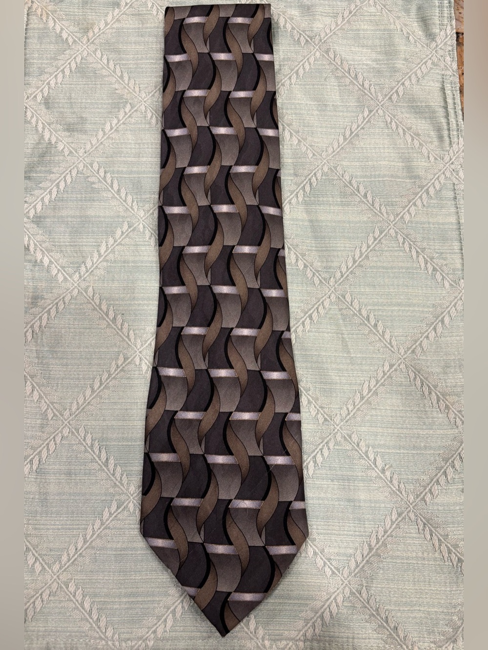 Via Europa Fine Neckwear 100% imported silk tie in a olive, charcoal, silver.